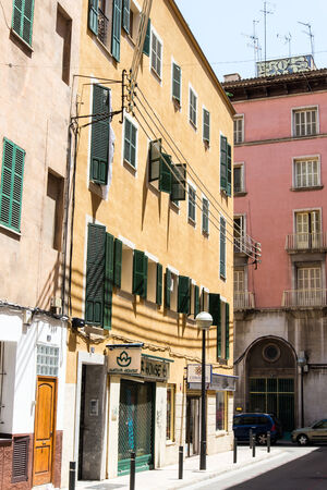 Old town street with coloured housesのeditorial素材