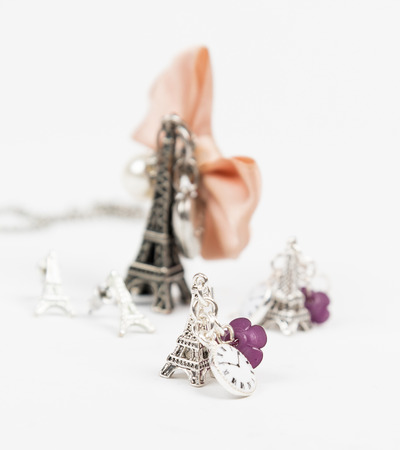 Necklace and earring with eiffel shape isolated on whiteの写真素材