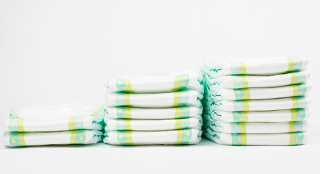 Stack of Diapers at the nursery isolatedの写真素材