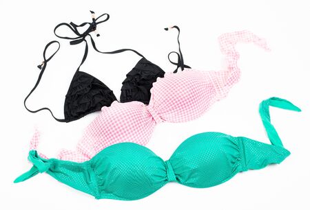 Three bikini tops isolated on whiteの写真素材