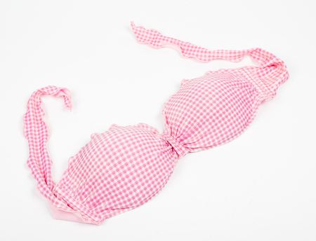 Pink bikini top isolated on whiteの写真素材