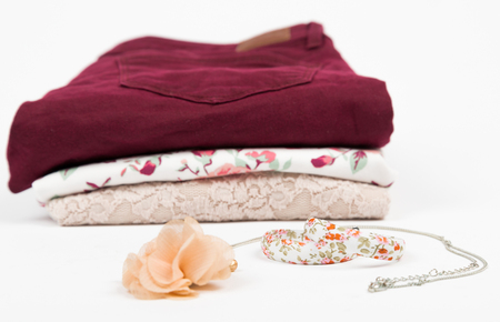 Outfit of clothes and woman accessories with white backgroundの写真素材