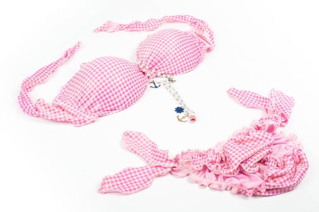 Bikini with accessories isolated on whiteの写真素材