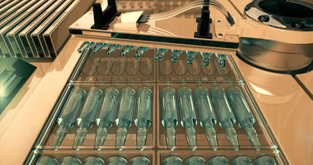 Pharmaceutical manufacturing line. Cardboard automatic factory packaging machine for packaging ampoules with vaccine and medicines.の写真素材