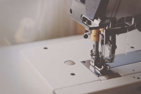 Industrial flat-seam sewing machine. Close-up. Soft focusの写真素材