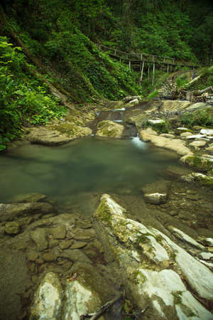 Waterfall in the rainforest. Stormy mountain river.の写真素材