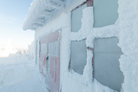 Frozen doors of a Buddhist temple. high in the mountainsの写真素材