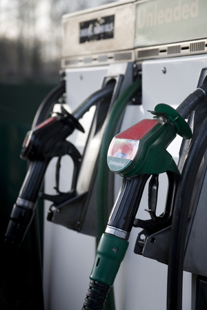 Petrol and diesel filling nozzles at UK service stationのeditorial素材