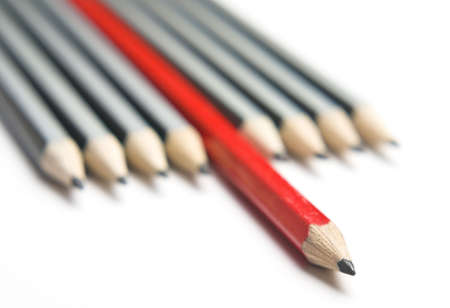 Group of pencils with one highlighted as business concept for leadership, winning and standing out from the crowd.の写真素材