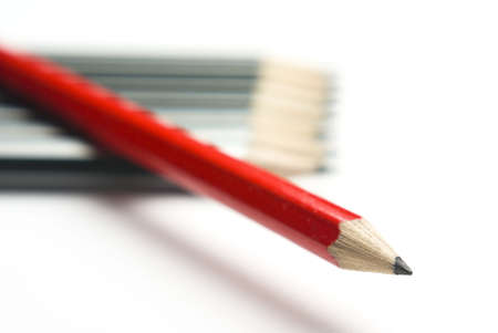 Group of pencils with one highlighted as business concept for leadership, winning and standing out from the crowd.の写真素材