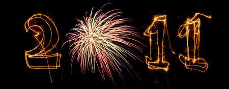 Year 2011 written in sparklers. Zero replaced with fireworks display. Use for celebrations like New...