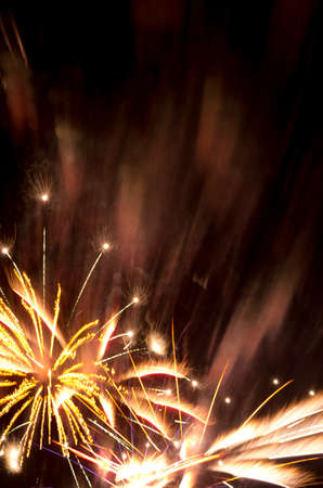 Golden fireworks burst and copy space suitable for New Year, 4th July, Bastille Day, wedding