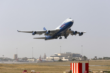 Luqa, Malta - June 16, 2016: Silk Way Airlines Boeing 747-4R7F(SCD) [4K-SW888] on departure to Mali.のeditorial素材