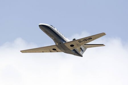 Luqa, Malta - July 2, 2016: A private Cessna 525A Citation CJ2 [D-ISUN] climbing out of runway 13.のeditorial素材