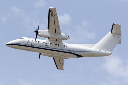 Luqa, Malta - July 2, 2016: Medavia De Havilland Canada DHC-8 Dash 8 [9H-AEW] climbing out of runway...