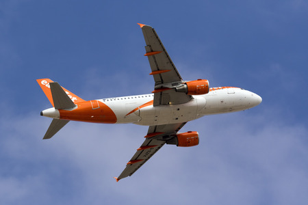 Luqa, Malta - 29 September 2016: EasyJet Airline Airbus A319-111 [G-EZFK] taking off from runway 13.のeditorial素材