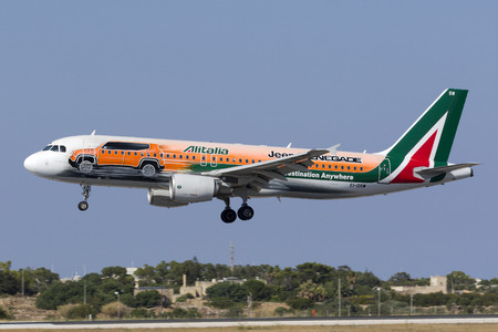 Luqa, Malta - July 20, 2017: Alitalia Airbus A320-216 [REG: EI-DSW] in special color scheme promoting the Jeep Renegade on finals runway 31. Daily flight from Rome, Italy.のeditorial素材