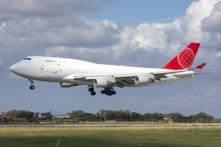 Luqa, Malta - May 15, 2019: Air Cargo Global Boeing 747-433M(BDSF) (OM-ACB) landing runway 31.のeditorial素材