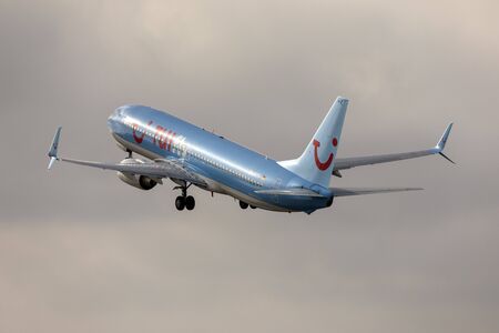 Luqa, Malta - September 23, 2019: TUIfly Boeing 737-8K5 (REG: D-ATYC) on take off from runway 13 in the morning.のeditorial素材