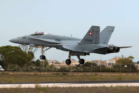 Luqa, Malta September 25, 2014: Swiss Air Force McDonnell Douglas F/A-18C Hornet arriving in Malta...