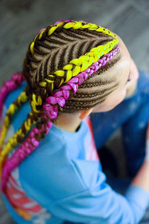 creative hairstyle of thin and thick plaits