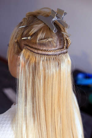 hair extensions, truss sewing, Hollywood build-up with pigtail