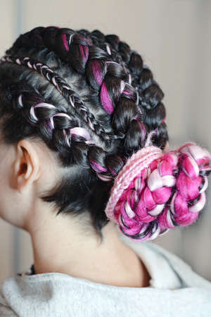 large braids with kanekalon, fashionable youth hairstyle, colored hair, the result of the work of...