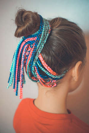 pigtails on the back of the head braided hair African braids, many thin braidsの写真素材