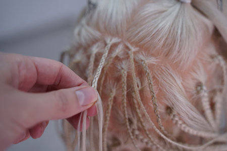 marking a mannequins head into zones, hairdressing, teaching students, hair cutting, braiding. The...