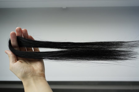 Artificial material for weaving African braids, colored kanekalon lies on the table, different materials for afro braidsの写真素材