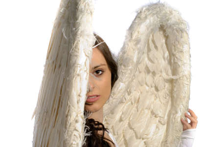 Young woman with angel wings isolated on whiteの写真素材