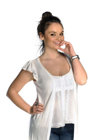 Smiling young woman standing portrait isolated on whiteの写真素材