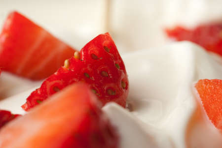 Side shot of thick yoghurt with berry slicesの写真素材