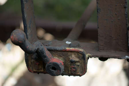 Coroded steel metal switch in rust isolated bokehの写真素材