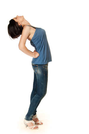 Young adult in blue jeans isolated on whiteの写真素材