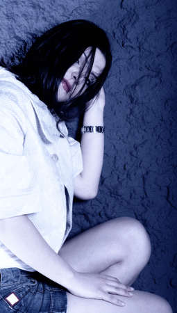 Provocative blue cyanotype of a girl in whiteの写真素材