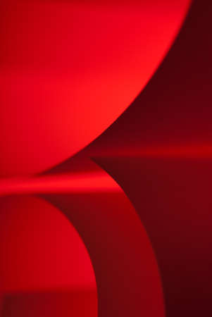 Red paper hard edge shapes abstract closeupの写真素材