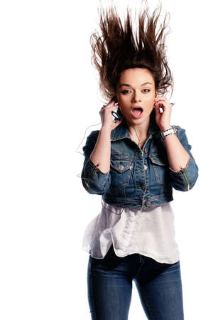 Beautiful young girl hair action isolated on whiteの写真素材