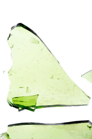 Large green shard of glass isolated on whiteの写真素材