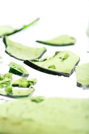 Green chunks of glass isolated on whiteの写真素材