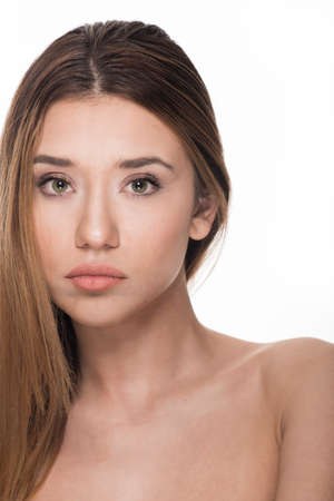 Portrait of a beautiful Caucasian woman isolated on whiteの写真素材