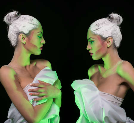 Artistic makeup model with white dress & hairの写真素材