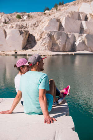 View of a romantic young couple enjoying in beautiful lake.の写真素材