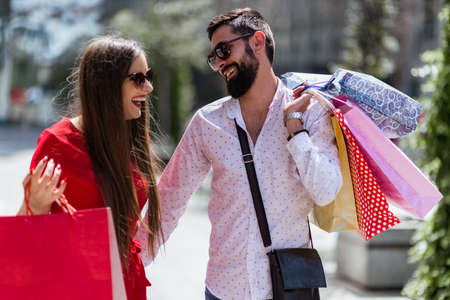 Shoping in the city.Loverly couple having fun on the Macedonian streets.の写真素材