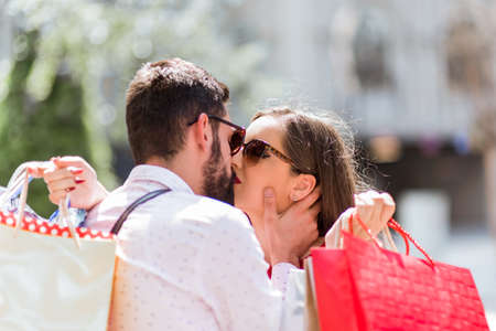 Shoping in the city.Loverly couple having fun on the Macedonian streets.の写真素材
