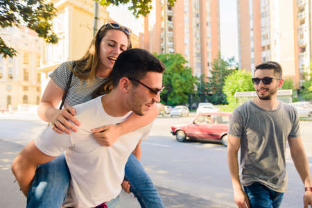 Happy friendship concept with young people having fun together