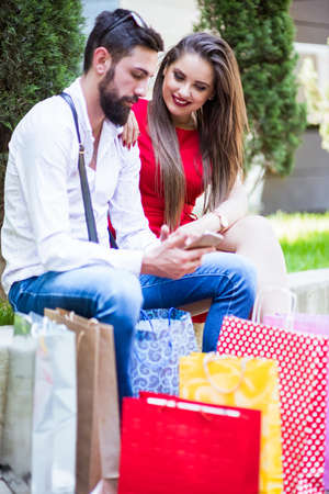 Shopping in the down town.Lovely couple having fun on the Macedonian streets,
on a sunshine day.の写真素材