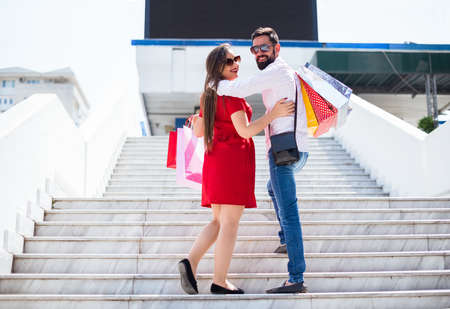 Shopping in the down town.Lovely couple having fun on the Macedonian streets,
on a sunshine day.の写真素材