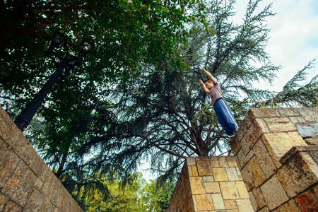 Free runner prepare to jumping on the wallの写真素材