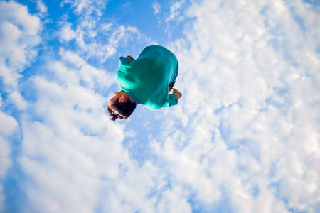 Youung man in air while training parkourの写真素材